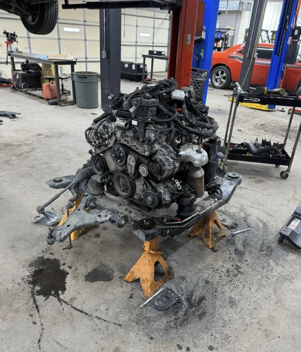 Rebuilt V8 engine in a classic car at Total Turf & Auto